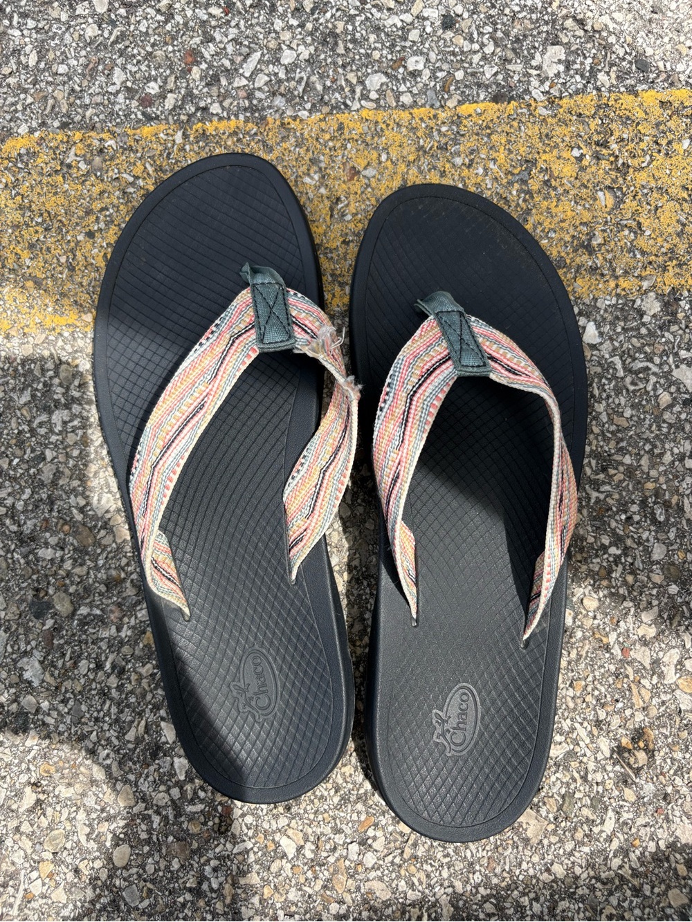 Chaco Black Flip Sandals with Striped Pastel Straps